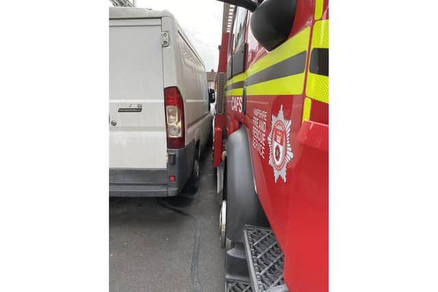 Southsea firefighters have released a photograph showing the tight squeeze they had getting their fire appliance past a van parked on a residential Portsmouth street.
Picture from @Southsea24, the fire station Twitter feed, used with permission