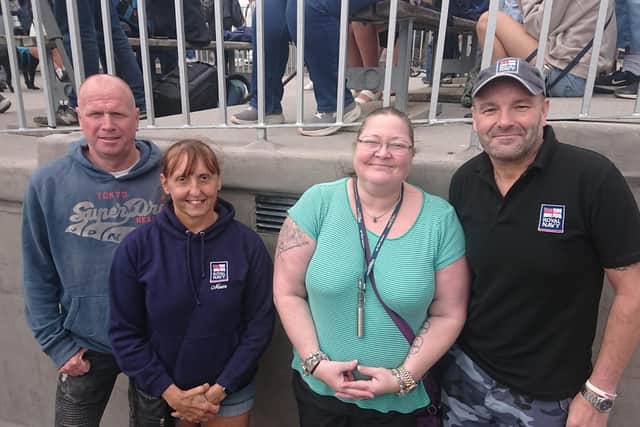 Steven and Andrea Warne alongside Sarah and Kieron Wilcock waiting for their loved ones aboard HMS Prince of Wales.