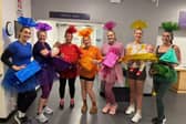 Winners MR Reunite dressed as chocolates from a box of QualityStreet