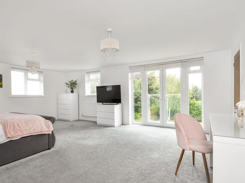 This property comes with five bedrooms, four reception rooms and three bathrooms.