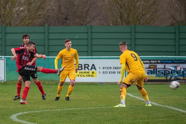 Jack Breed, left, takes a shot at goal during Fareham's Wessex Premier game with Bashley in November 2019. Picture: Vernon Nash