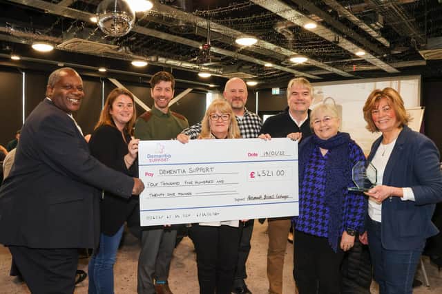 Portsmouth Business Networking Event organiser Penny Pilmoor, along with business owners Phil Mundy, Patricia Wakeford, Chris Handley, Lincoln Noel, Gayle Tong and Fiona Heath presented a cheque to Luke Knight of Dementia Support for £4521. Photos by Alex Shute