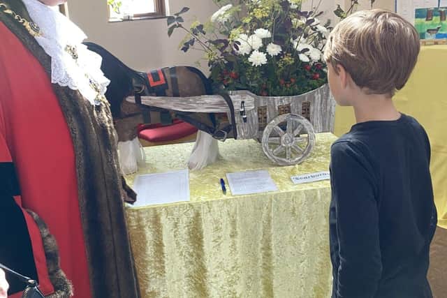 Shane telling Portsmouth's Lord Mayor how the horse and cart were made.