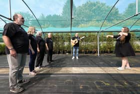 Dielle Hannah, right, performs with the Igloo Choir at Mount Folly Nurseries, Wickham. The choir are having a taster day on August 21st where all are welcome
Picture: Chris Moorhouse (jpns 120821-29)
