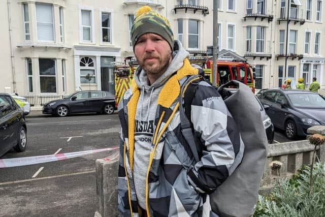 Local boxer Michael Trotman, who ran into the smoke-filled apartment building to knock on doors and sound the alarm.