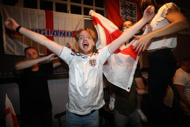 England fans pictured at the Artillery Arms in Portsmouth, UK, watching England play on TV in the Semi-finals at Wembley.

Pictured are fans enjoying the night.

Picture: Sam Stephenson