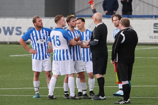 One of four red cards is shown to a Coach & Horses Albion player. Picture by Kevin Shipp