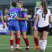 Emma Jones is congratulated for her winner against MK Dons in the National League Cup