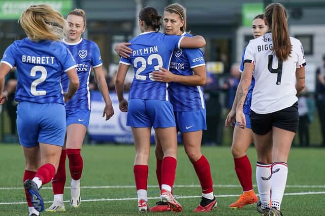 Emma Jones is congratulated for her winner against MK Dons in the National League Cup