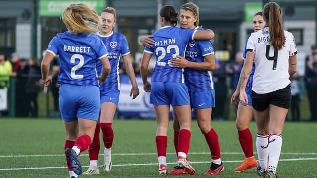 Emma Jones is congratulated for her winner against MK Dons in the National League Cup