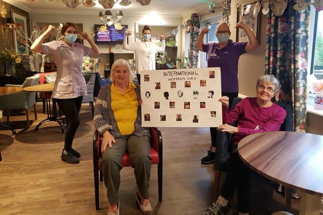 Margaret Horsted and Sue Cobb, residents at Care UK's Pear Tree Court, as well as team members Chloe Turner, Emily Forbes and Jacqui Dye celebrate International Women's Day
