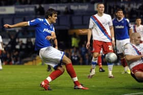 Marlon Pack fires in an attempt on goal on his Pompey debut against Crystal Palace in August 2010. Picture: Mick Young