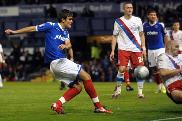 Marlon Pack fires in an attempt on goal on his Pompey debut against Crystal Palace in August 2010. Picture: Mick Young