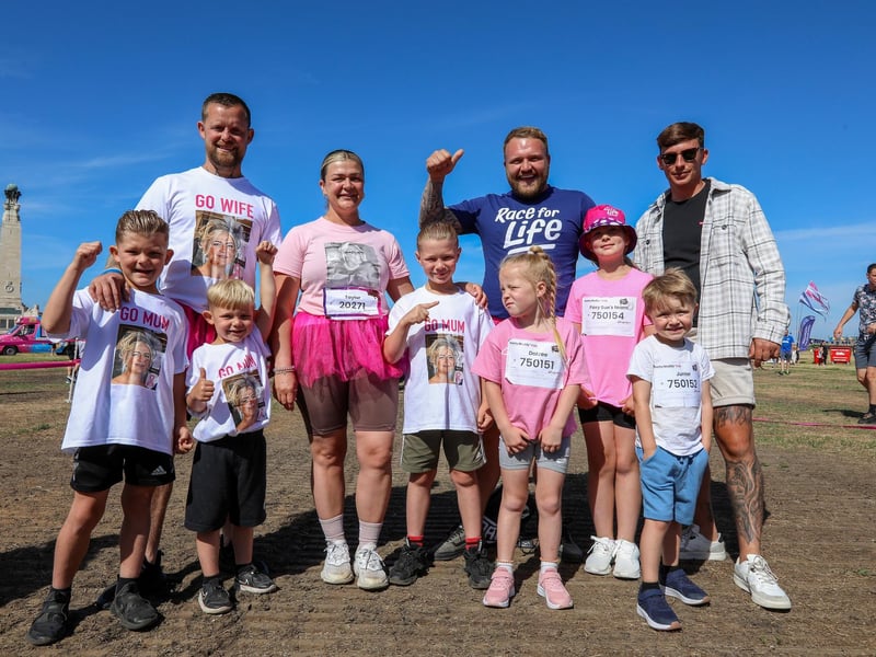 Taylor (in pink tutu) and her family and supporters. Race For Life Pretty Muddy, Southsea CommonPicture: Chris  Moorhouse (290624-009)