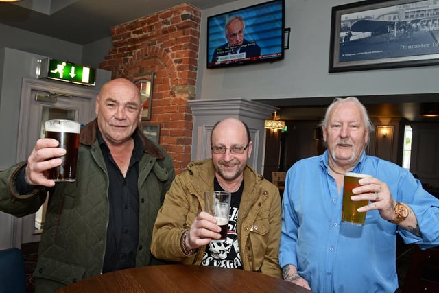 Russell Owen, Des Spencer and Ken Redmile, of Doncaster, enjoying a pint at the town's Wetherspoon pub The Red Lion.