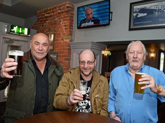 Russell Owen, Des Spencer and Ken Redmile, of Doncaster, enjoying a pint at the town's Wetherspoon pub The Red Lion.