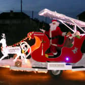 The Gosportarians and Malcolm Dent in the Christmas Sleigh in 2019.