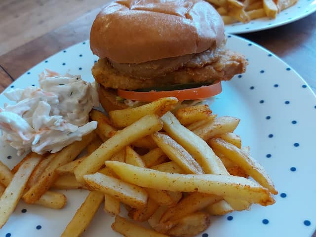 One of the vegan burgers with garlic fries and coleslaw