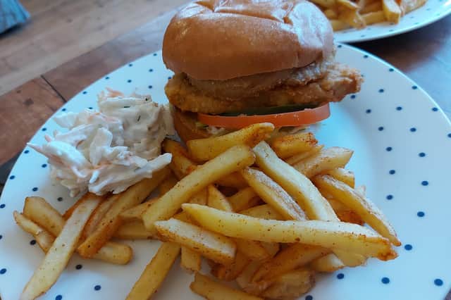 One of the vegan burgers with garlic fries and coleslaw
