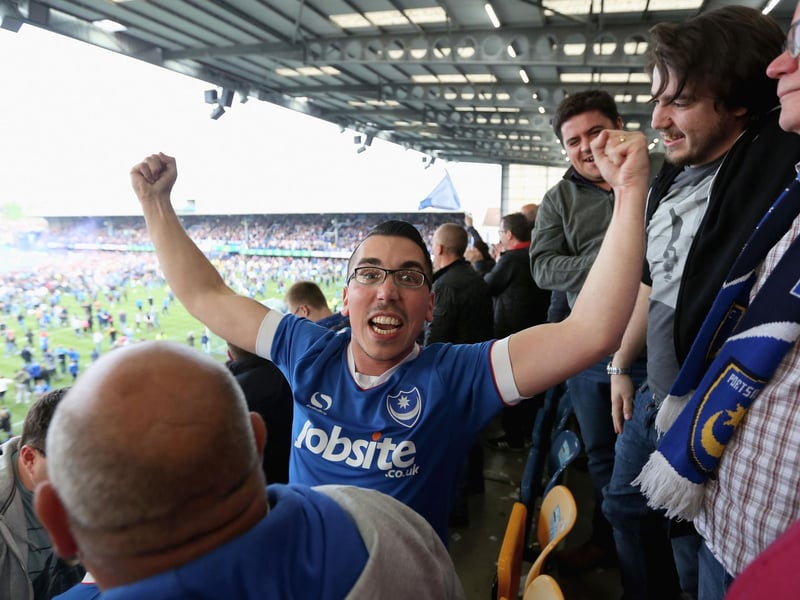 A Pompey fan celebrates the League Two title win after a 6-1 thrashing of Cheltenham at Fratton in May 2017. Photo by Harry Murphy/Getty Images