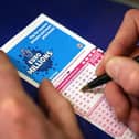 A woman from Portsmouth has become a millionaire.