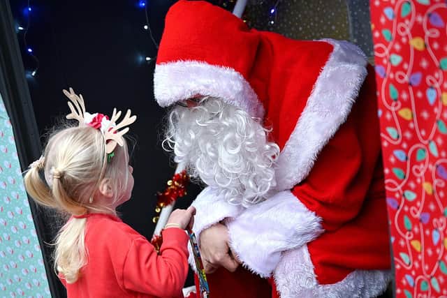 Pre-School in awe of Father Christmas