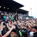 Carlisle United fans celebrated their League Two play-off semi-final win against Bradford City last season with a pitch invasion