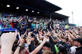 Carlisle United fans celebrated their League Two play-off semi-final win against Bradford City last season with a pitch invasion