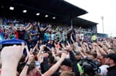 Carlisle United fans celebrated their League Two play-off semi-final win against Bradford City last season with a pitch invasion