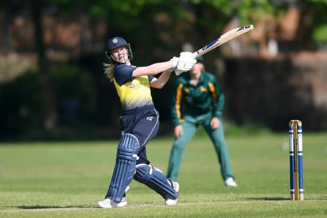 Former Havant player Emily Windsor hits out while playing for Hampshire in a Royal London Cup tie against Nottinghamshire at Havant Park in 2018. Picture: Neil Marshall