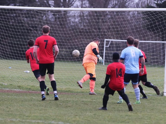Portchester Rovers (blue) v Horndean United. Picture: Sam Stephenson.