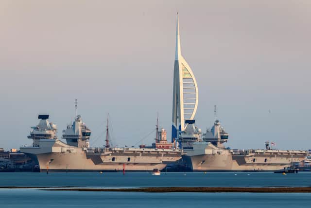 HMS Queen Elizabeth and HMS Prince of Wales pictured alongside together in Portsmouth. Photo: LPhot Unaisi Luke