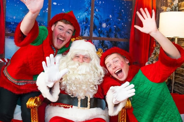 Father Christmas and his elves in the grotto