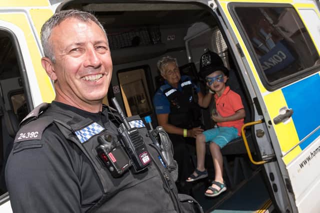 PC Daz Graham with PCSO Ann Adams of Hampshire and Isle of Wight Constabulary Fareham Neighbourhood Team at 999 day in 2018.