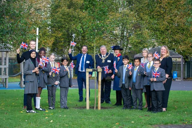 Ark Dickens pupils with cllr Rob Wood, Mayor Frank Jonas, The Deputy Lieutenant, Lady Portal and Lady mayoress Joy Maddox and Head of School, Laura Berry.
Picture: Habibur Rahman