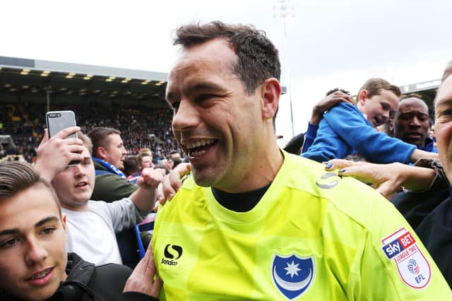 David Forde celebrates Pompey's League Two promotion at Notts County. Picture: Joe Pepler