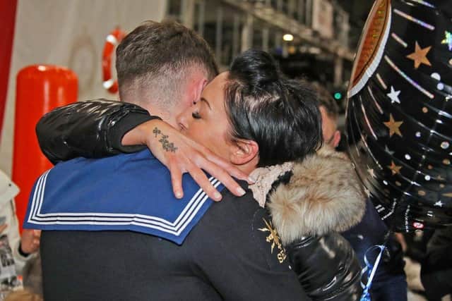 Able Seaman Rhys Zanetti got a big surprise for his 18th birthday on board HMS Prince of Wales – when his family sneaked on board to present him with a birthday cake. Pictured: Rhys hugging his family. Photo: Royal Navy