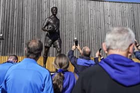 Crowds gathered to see the unveiling at midday. Picture: Jason Brown.