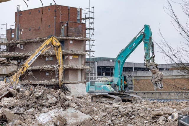 The demolition team at work to remove the last of the structure. Picture: Mike Cooter (110324)