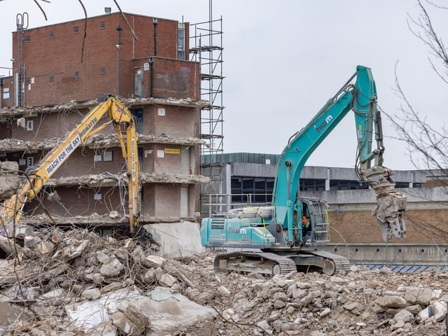 The demolition team at work to remove the last of the structure. Picture: Mike Cooter (110324)