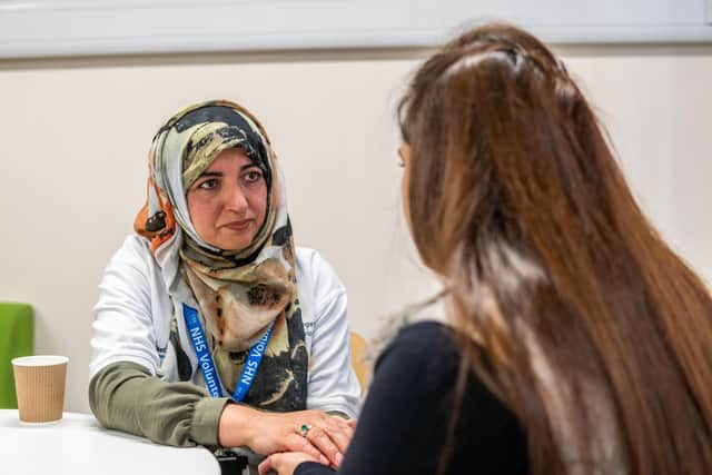 A healthcare volunteer at work