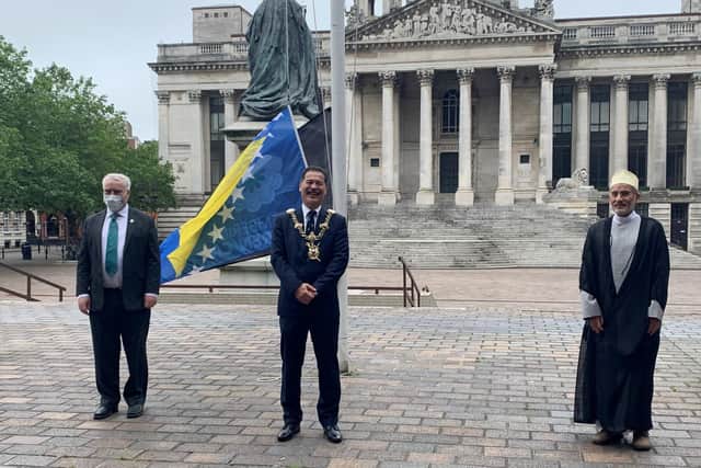 Flags were raised outside Portsmouth Civic Offices to remember the genocide in Srebrenica 25 years ago (L-R Cllr Gerald Vernon-Jackson; Cllr Rob Wood; Sheikh Fazle Abbas Datoo)
