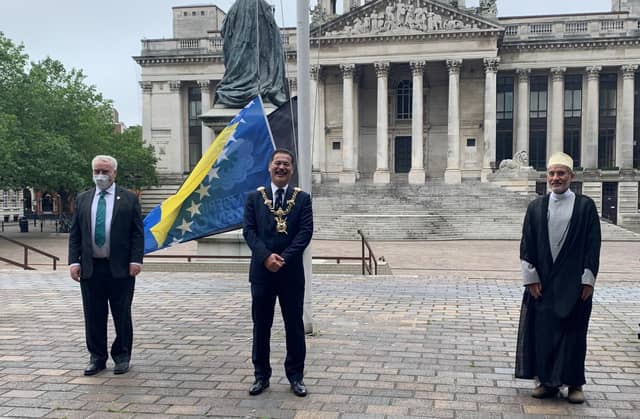 Abas Datoo Flags raised outside Portsmouth Civic Offices to commemorate 25th ...