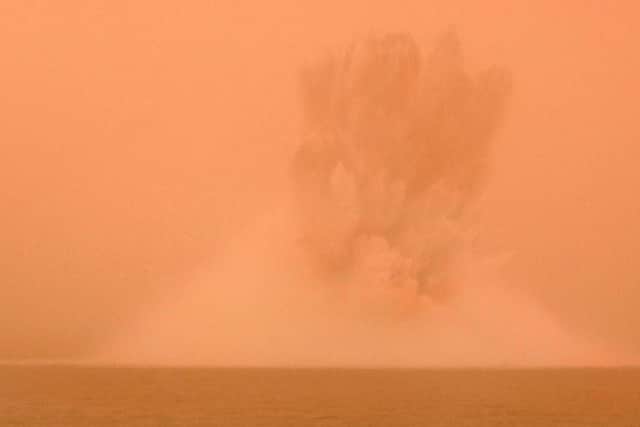 Pictured: Demonstration detonation for the media during a sand storm.
Historic ordnance disposal media facility off the coast of Kuwait. 30/04/08.

Released by PRO Lt Ashwood RN CMF Bahrain