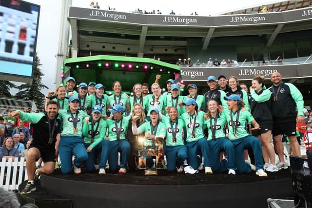 Oval Invincibles players celebrate with the inaugural Hundred trophy after the Women's Final against Southern Brave. Picture: Steven Paston/PA Wire.
