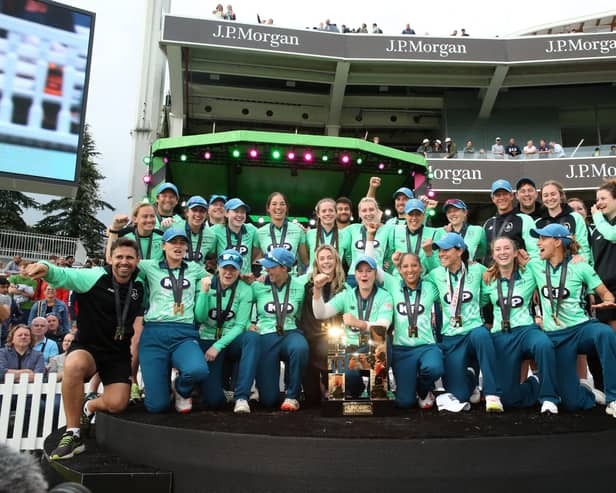 Oval Invincibles players celebrate with the inaugural Hundred trophy after the Women's Final against Southern Brave. Picture: Steven Paston/PA Wire.