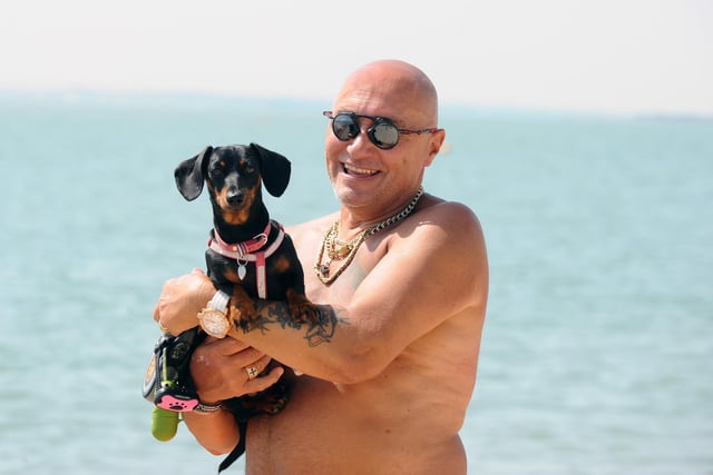 Andy Grubb from Southampton with his Dachshund Pebbles at Lee-on-the-Solent.

(170622-6945)
