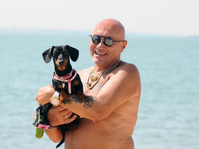 Andy Grubb from Southampton with his Dachshund Pebbles at Lee-on-the-Solent.
(170622-6945)