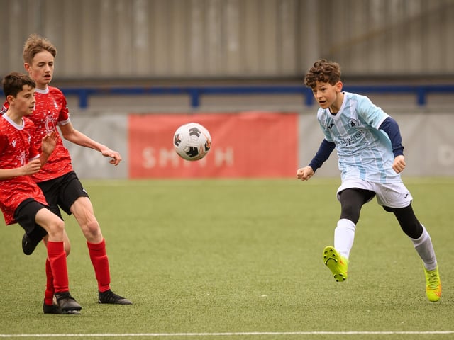 Action from the Portsmouth Youth League Geldard Invitation Cup final between Jubilee 77 U13s and Castle United U13s (light blue and white kit). Picture: Keith Woodland (190321-703)