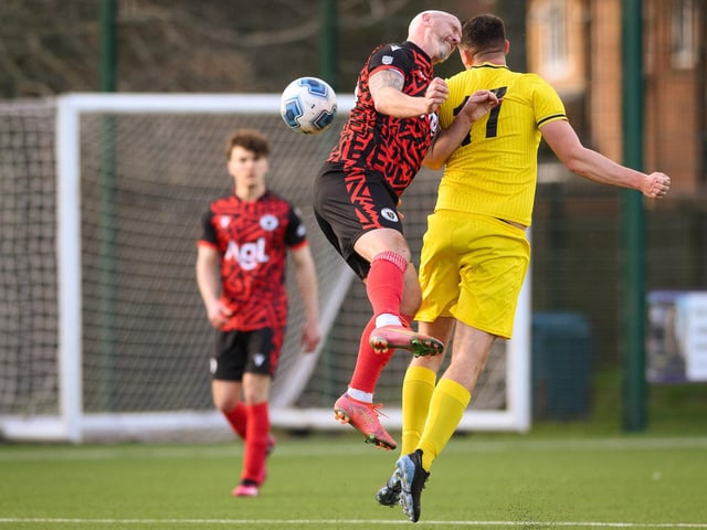 Action from Harvest's 4-1 win at home to Locks Heath (red and black kit) in the Hampshire Premier League. Picture: Keith Woodland (180321-1299)